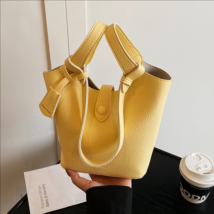 Korean style large-capacity hand-held bucket bag for women, new Spring/Summer 2025, lychee-patterned vegetable basket single-shoulder crossbody bag full figure