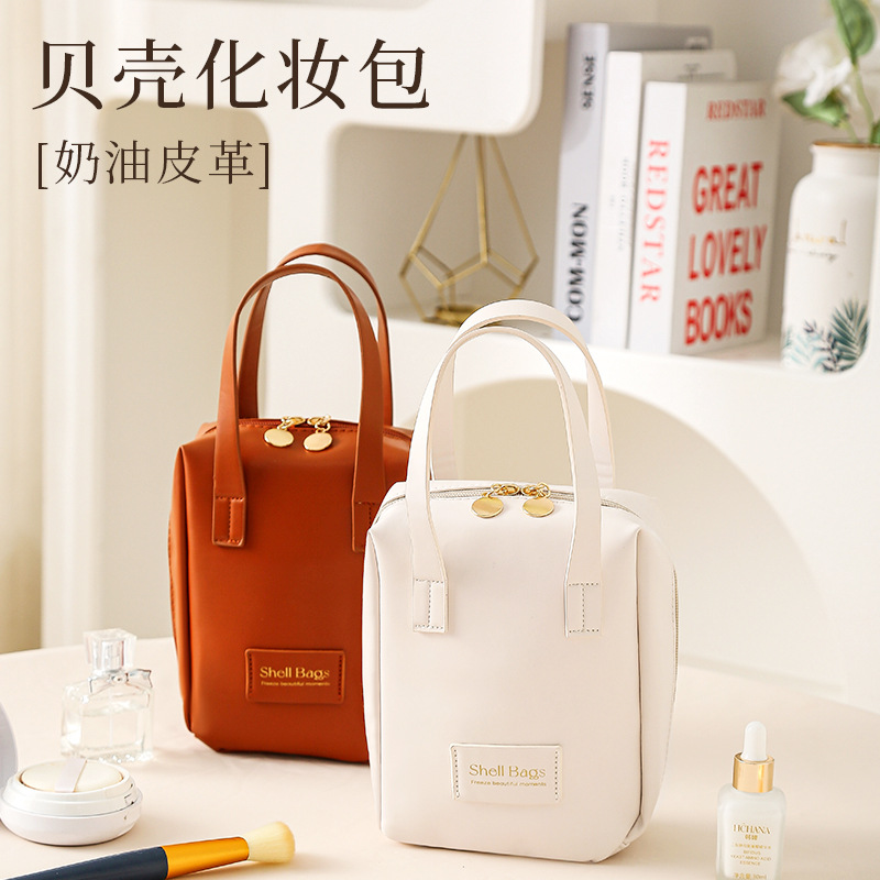 Wholesale of portable large-capacity cosmetic bags with shells, red makeup brushes and travel toiletries full figure
