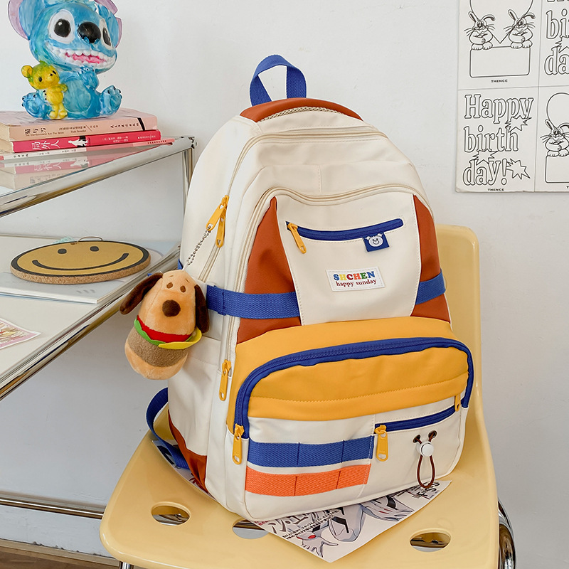 High-appearance-level schoolbag for female college and high school students, cute color-blocking backpack, niche design sense, funny girl backpack Specification drawing