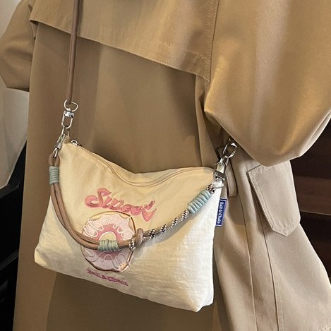 New Spring/Summer 2025 style eco-friendly shopping bag with embroidery, large-capacity hand-held bag, shoulder crossbody canvas Application Scenario