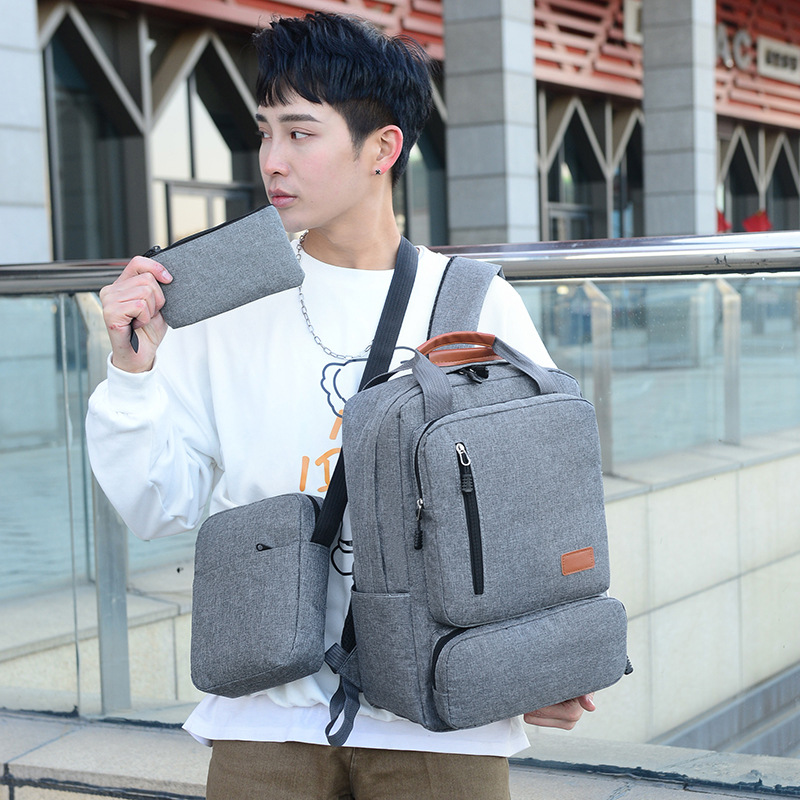 A new set of three-piece business backpacks, a large-capacity Oxford cloth computer bag for casual use, and a lightweight college student schoolbag are designed details Picture