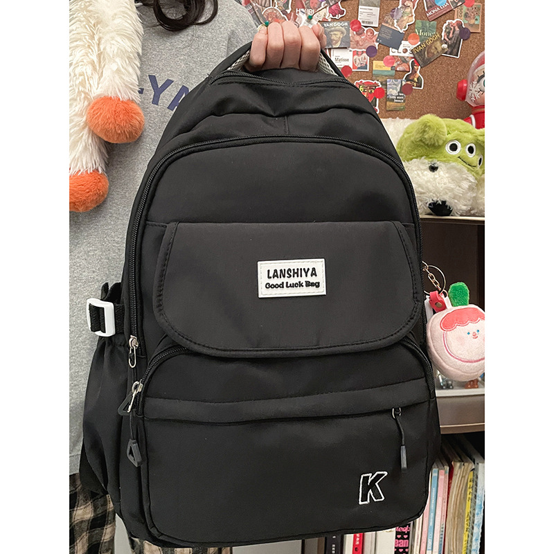 The new casual backpack is versatile for both male and female high school and college students. It is a large-capacity, fashionable, solid-color backpack in Korean style details Picture