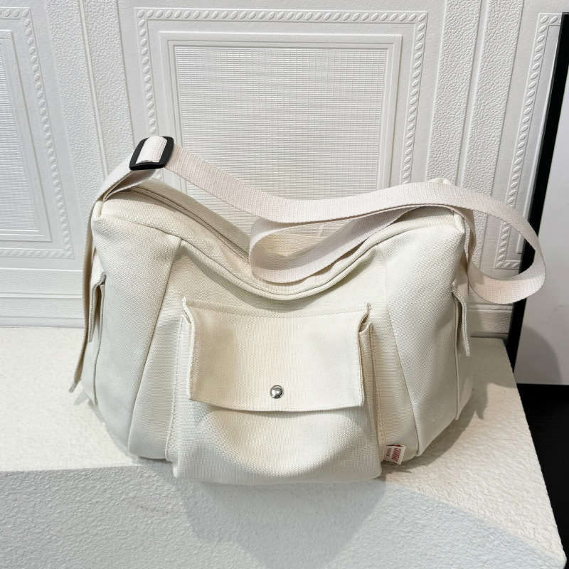 New canvas tote bag for autumn and winter, solid color for girls, large-capacity commuter messenger bag, versatile, single-shoulder fashionable crossbody bag full figure