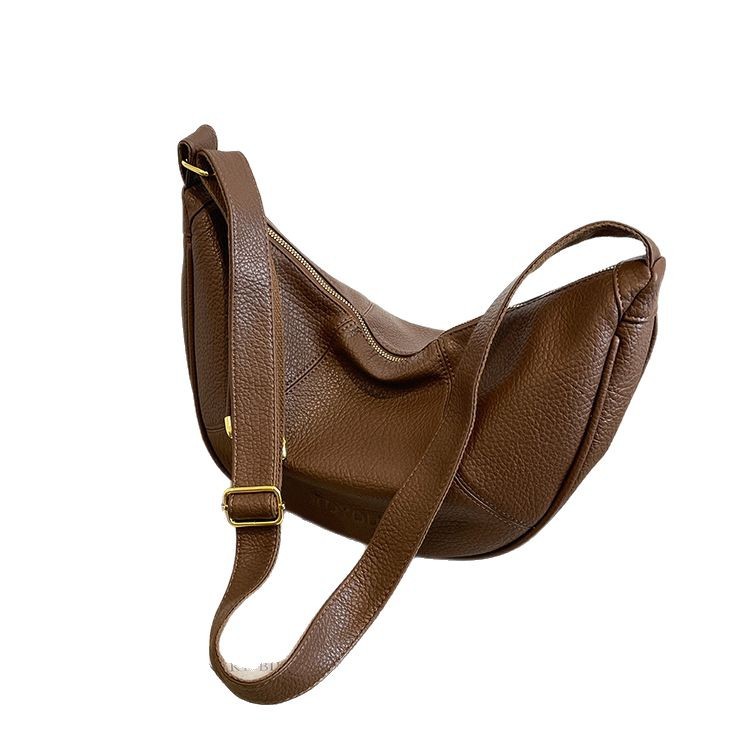 A niche design and fashionable dumpling bag for women, 2025 new Korean version hand-held shoulder bag, solid color, versatile and retro crossbody bag Item Picture
