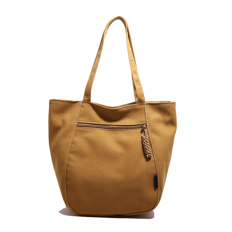 A new large-capacity fashionable tote bag in a solid color, simple and versatile single-shoulder bag, a college student commuting bag for classes, and a bestseller for women Item Picture