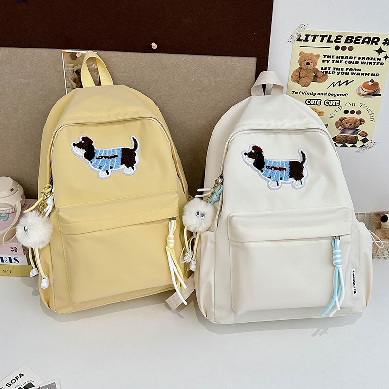 New cartoon schoolbag, cute cartoon Dachshund for junior high school students, large-capacity backpack, and backpack for high school girls attending classes full figure