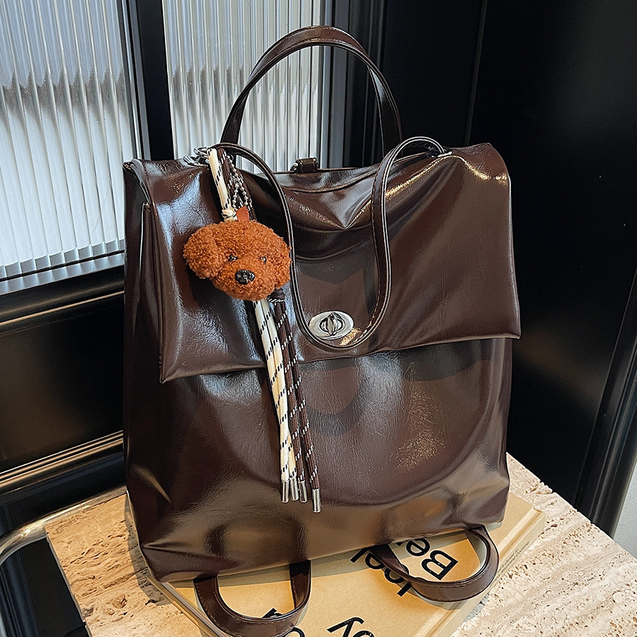 High-end quality travel backpack for women, 2024 new style, fashionable and retro, large-capacity schoolbag, college student hand-held backpack full figure