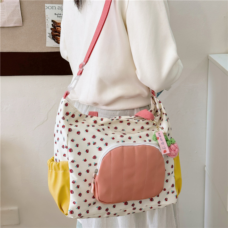 2024 New Japanese-style fresh and light fabric bag, tote bag, strawberry large-capacity single-shoulder crossbody bag, college student class bag Application Scenario
