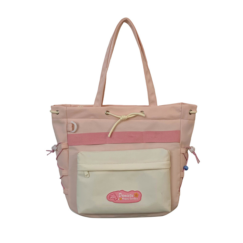 A large-capacity color-blocking school-style single-shoulder bag for female junior high school students to carry books during class tutoring. A high-appeartion-level student crossbody bag Item Picture