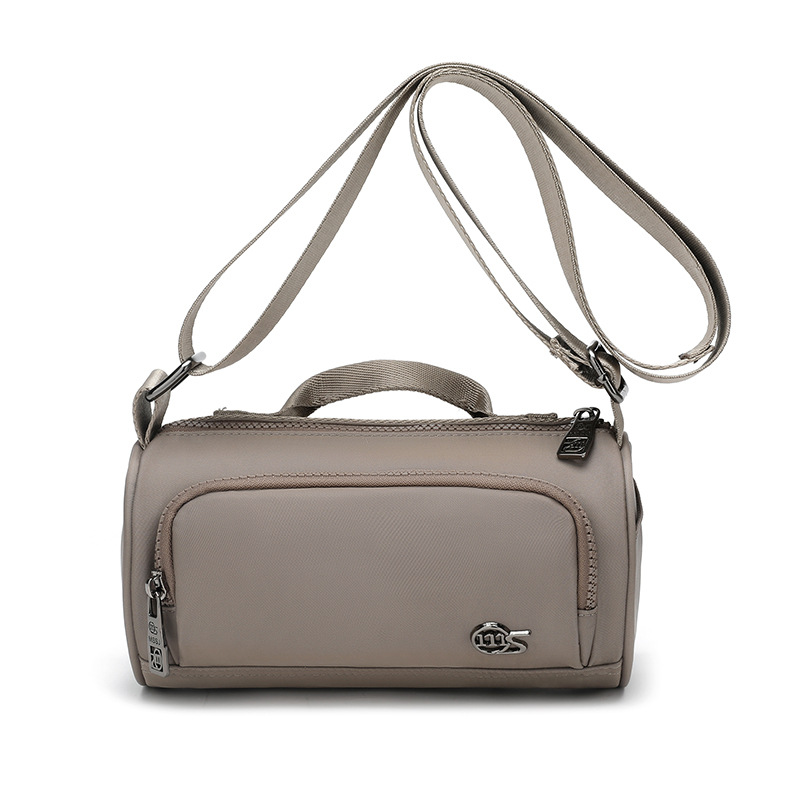 This is a new design for women's bags in autumn. The waist bag is simple and solid in color, cylindrical. It's a trendy, cute and fashionable single-shoulder crossbody bag for little girls Item Picture