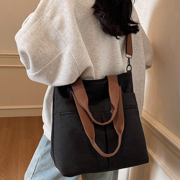 The 2025 new single-shoulder bag for women is a trendy, versatile, simple and fashionable Korean-style large-capacity hand-held and crossbody canvas bag details Picture
