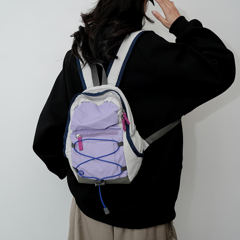 Outdoor backpack, drawstring mini casual bag, lightweight and versatile travel and mountaineering bag, women's lightweight travel small backpack Application Scenario