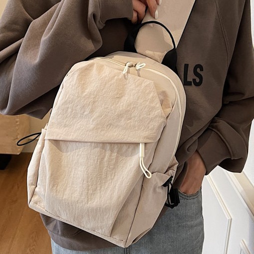 Solid-color backpack crossbody bag for men and women, light, simple, casual and fashionable new couple single-shoulder chest bag, trendy Application Scenario