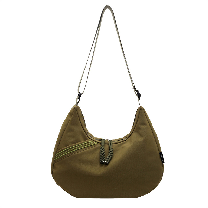 The new large-capacity tote bag is lightweight and versatile. The solid-color crescent-shaped bag, the fashionable college-style dumpling bag, and the portable student bag Item Picture
