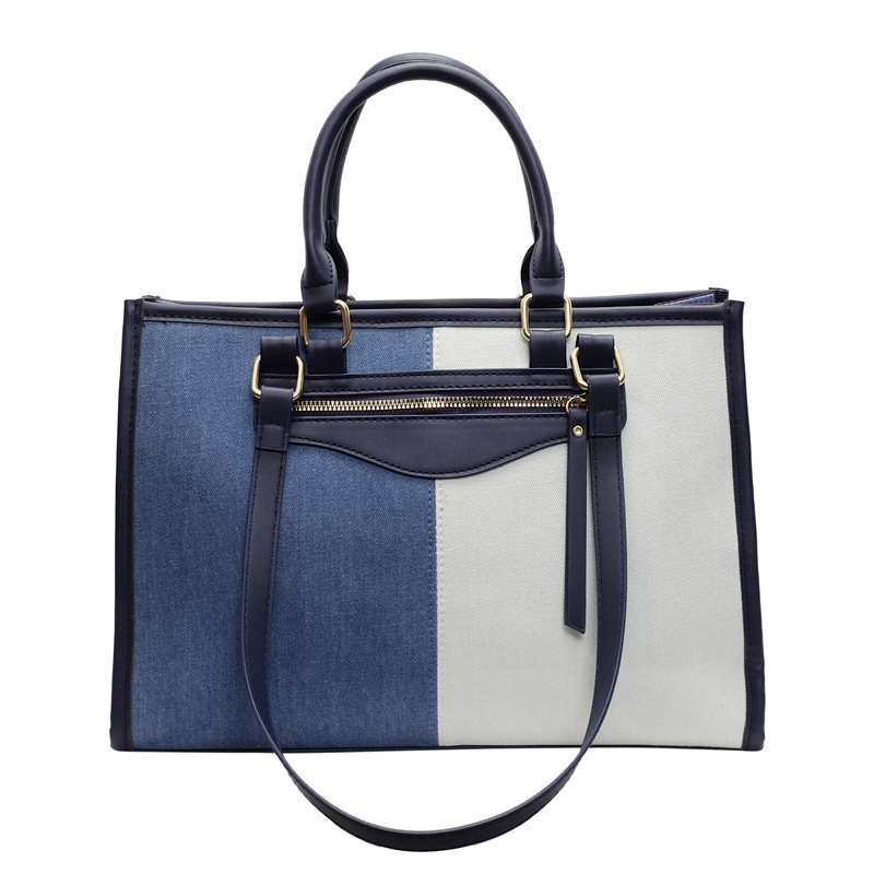 The new autumn and winter color-blocked denim hand-held shoulder bag, large-capacity underarm bag, and the trend of women's commuting briefcases for work Item Picture