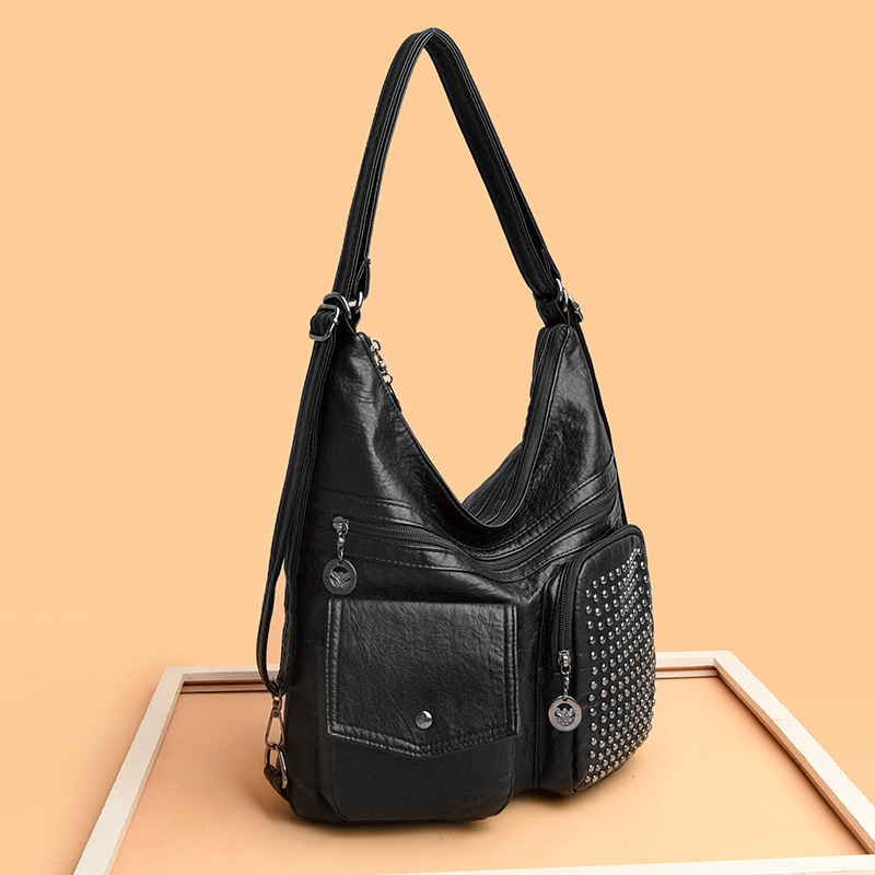 The new PU soft leather women's bag is versatile and fashionable. It's a multi-layered small bag with rivets and a casual single-shoulder crossbody bag full figure