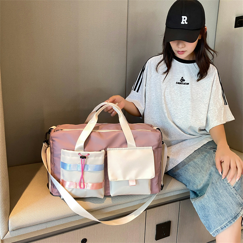Travel bag for women, large-capacity portable, lightweight and waterproof luggage bag, short-distance business trip, travel, boarding, maternity bag, storage bag details Picture