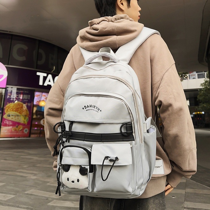 A new 2024 personalized large-capacity backpack for middle school students, a Japanese trendy brand travel backpack for college students and couples full figure