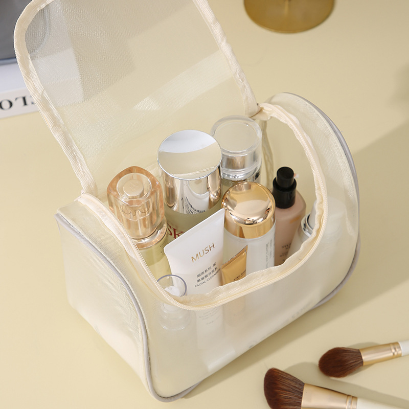 Mesh hand-held makeup bag, large-capacity portable cosmetics storage bag, multi-functional toiletries bag, high appearance level curved bag Specification drawing
