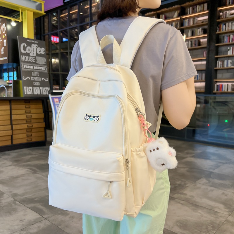 Cute schoolbag for girls, large-capacity backpack for junior and senior high school campuses, simple solid-color backpack for girls, high appearance level casual bag full figure