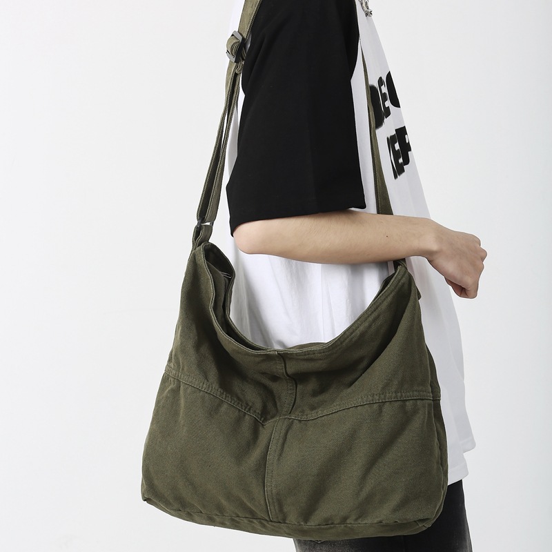 Japanese-style canvas crossbody bag for women, in an Instagram casual, artistic, retro and laid-back style, single-shoulder bag for men, a backpack for college students' classes details Picture