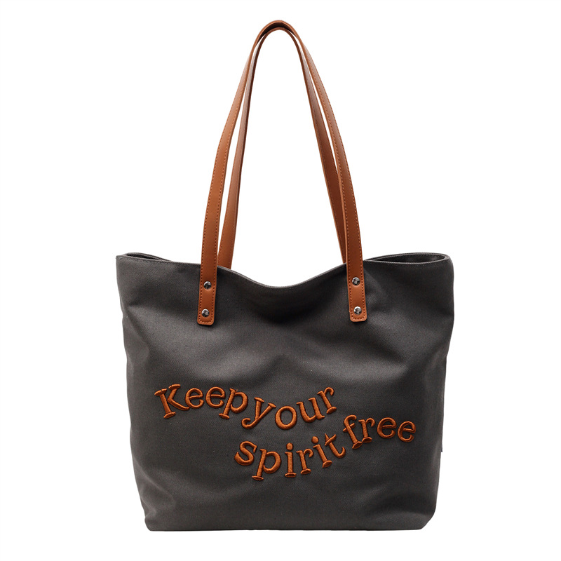 Canvas bag for women, 2025 new Korean version, large-capacity single-shoulder bag for work, embroidered letter tote bag for college students' classes Item Picture
