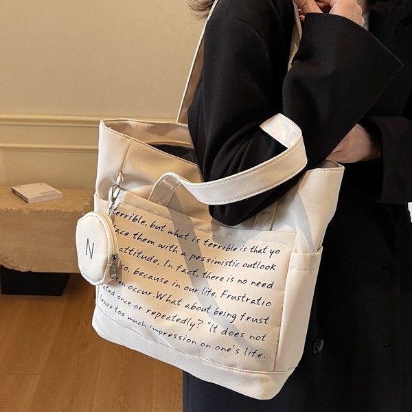 Fashionable and casual lettered canvas bag for women, versatile, large capacity for students to attend classes and commute, large capacity underarm single-shoulder bag full figure