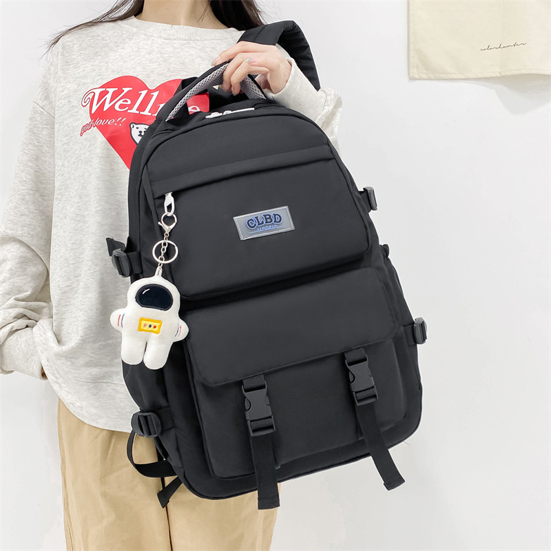 Wholesale of new large-capacity, simple and casual outdoor travel backpacks for junior and senior high school students Item Picture