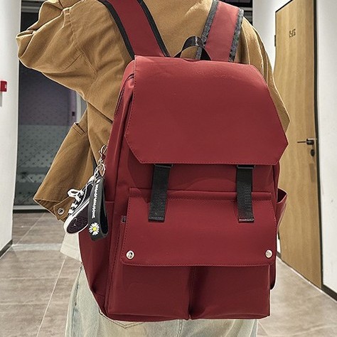 Korean-style ins fashion versatile large-capacity couple backpack for junior high school, senior high school and college students, solid-color multi-pocket travel backpack full figure