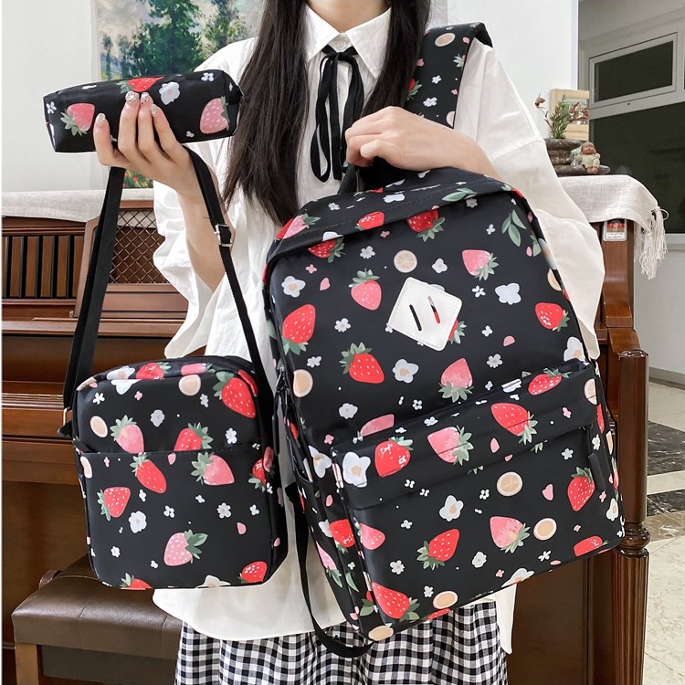 A new Korean-style versatile casual bag with a large capacity. It is a strawberry print backpack for primary, middle and high school students with a high level of appearance Application Scenario
