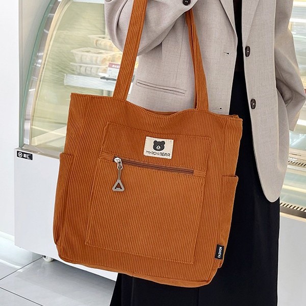 New autumn and winter 2024 large-capacity storage bag, school-style hand-held student tutorial bag, casual commuting single-shoulder bag Application Scenario