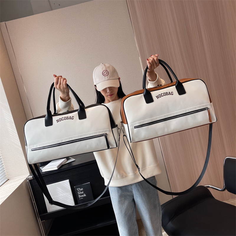 New large-capacity luggage bag for short business trips, fashionable color-blocking travel bag, simple hand-held shoulder bag for clothing storage Specification drawing