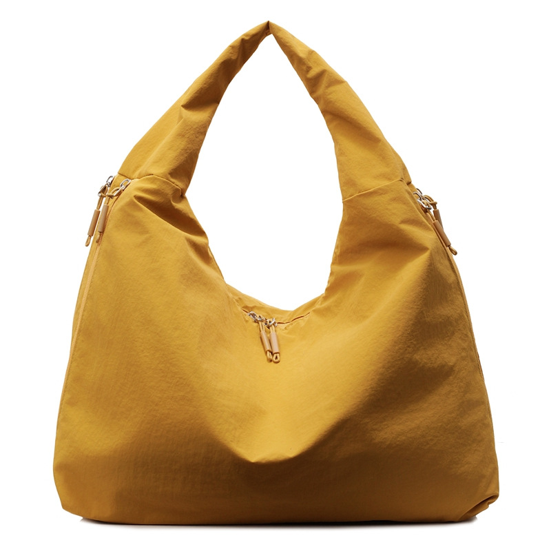 New large-capacity tote bag for women, simple solid color, niche and laid-back style single-shoulder bag, casual commuting and shopping fabric bag Item Picture