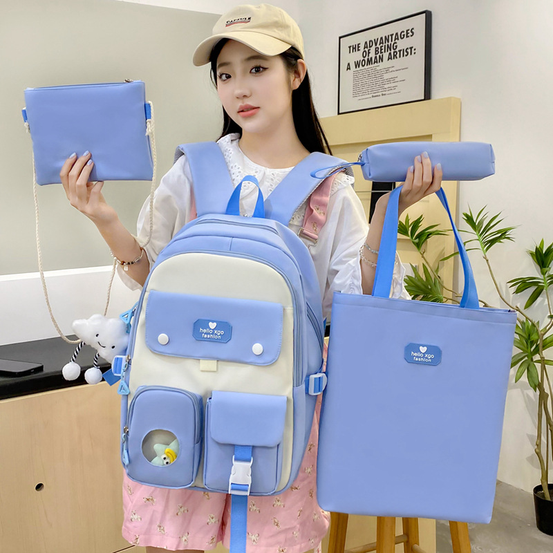 Campus four-piece set of schoolbag for junior high school students, a new Korean-style backpack with color contrast, and a large-capacity girls' backpack with reduced load Application Scenario
