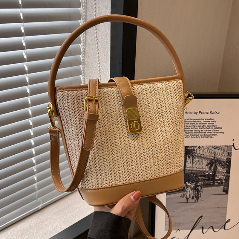 The 2024 new straw-woven bag for women is a trendy solid-color niche design crossbody bag and a versatile hand-held bucket bag full figure