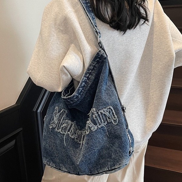 2025 New style pure beige retro fringed washed embroidered letter denim backpack, large capacity ins single-shoulder bag for women Application Scenario