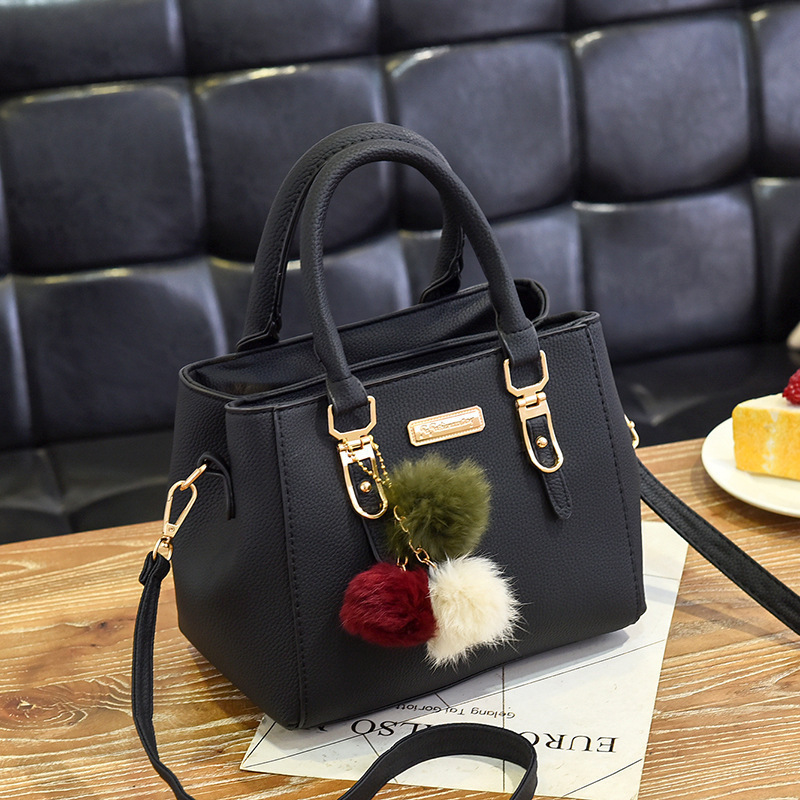 Bag Girl 2022 New European and American fashionable single-shoulder small bag Double-layer large capacity pom-ball hand-held crossbody women's bag consignment full figure