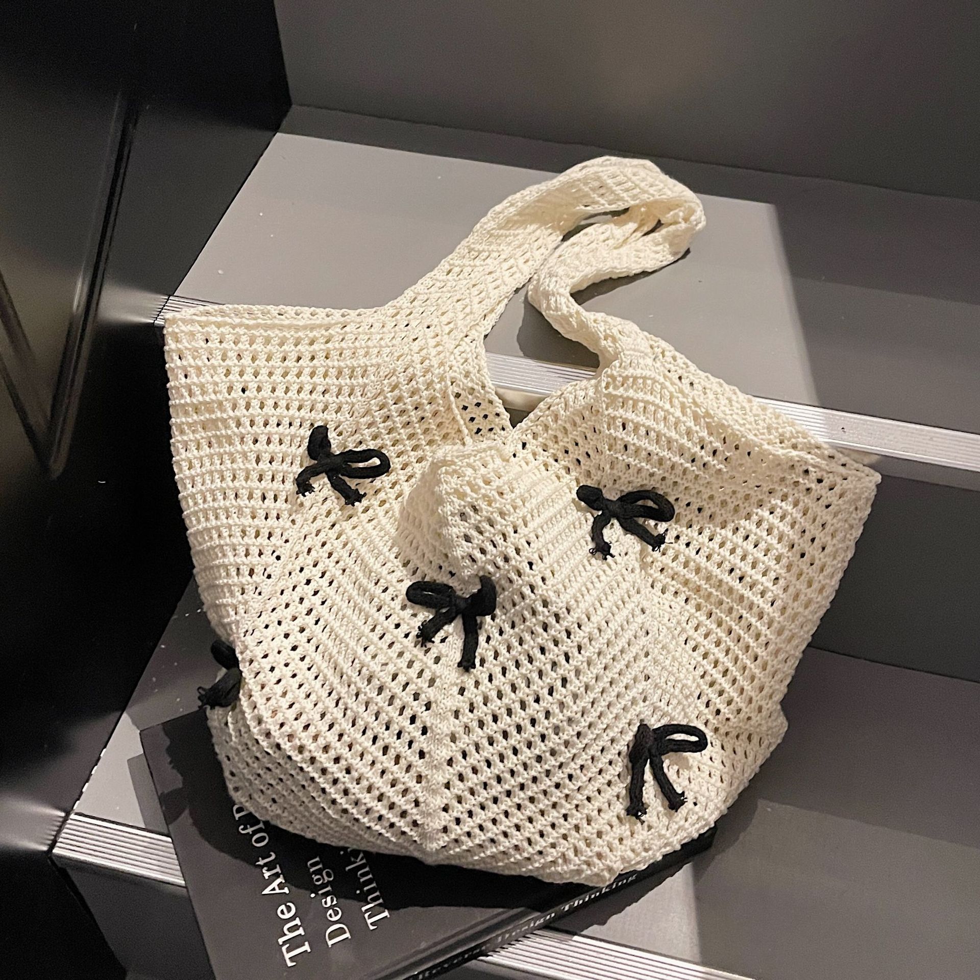 Lazy style large-capacity knitted tote bag for women, casual and versatile, bow niche woven bag, beach bag full figure