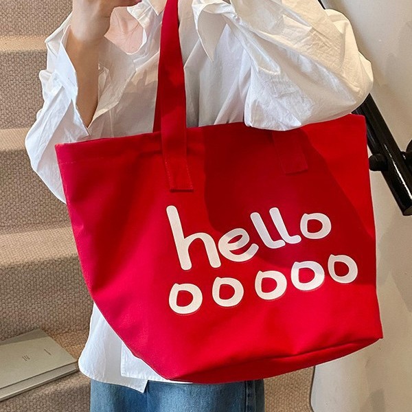 The new Korean version canvas bag, large-capacity single-shoulder lettered tote bag, simple and casual trendy bag, student shopping bag trend Application Scenario
