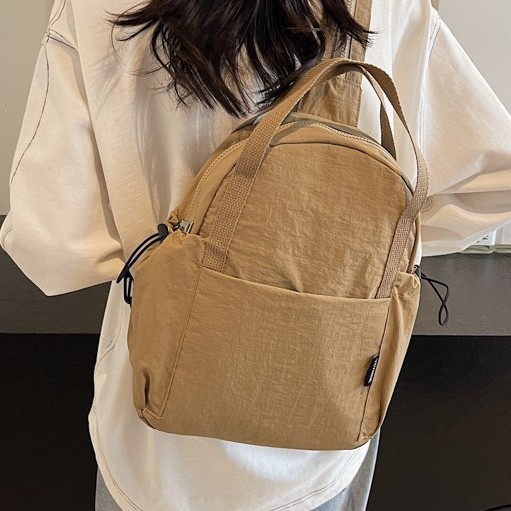 A lightweight and versatile casual backpack for women's shopping in 2024, a multi-functional chest bag, a sports bag and a fashionable travel bag full figure
