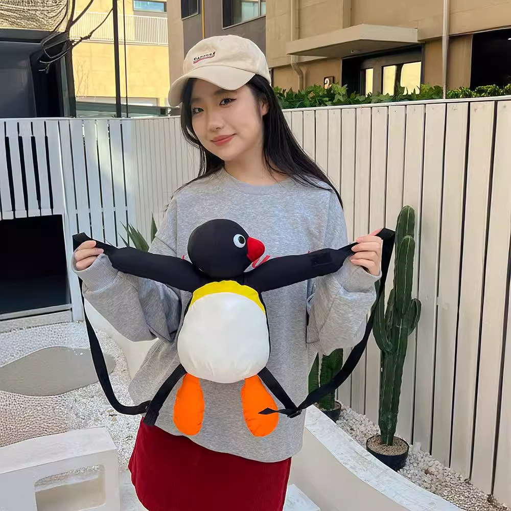Cartoon, funny and cute, hugging penguin, fashionable and individual, plush toy bag, children's bag, single-shoulder bag full figure