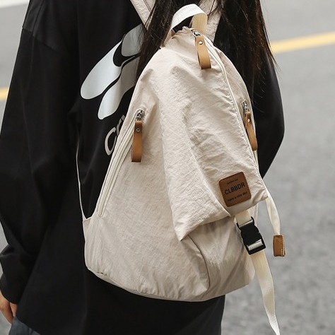 A new Japanese backpack for both men and women, a couple's style, a versatile student schoolbag, a large-capacity backpack, and a folding backpack details Picture