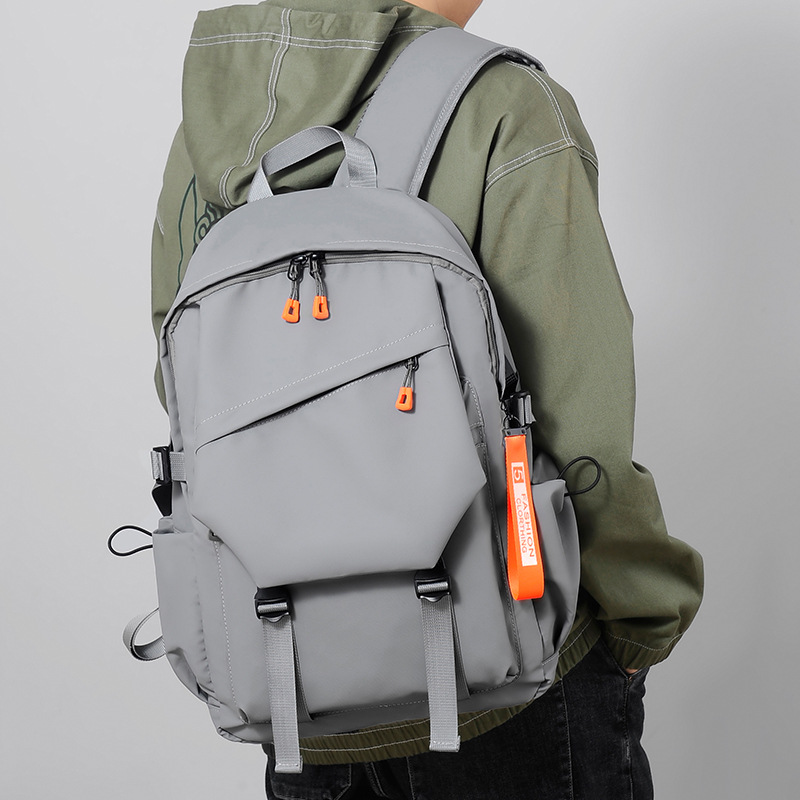 Trendy and casual backpack for men, large capacity, fashionable and high appearance level student schoolbag, high school and college student computer bag full figure