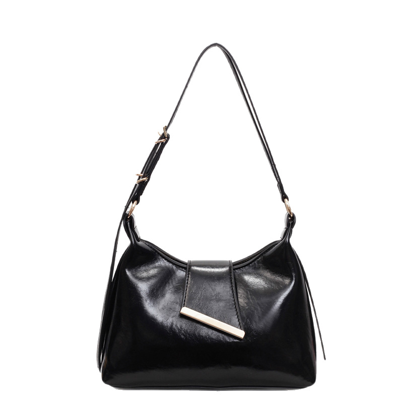 A fashionable and trendy solid-color commuter underarm bag for women in summer 2025, with a simple and versatile texture. It's a single-shoulder crossbody bag Item Picture