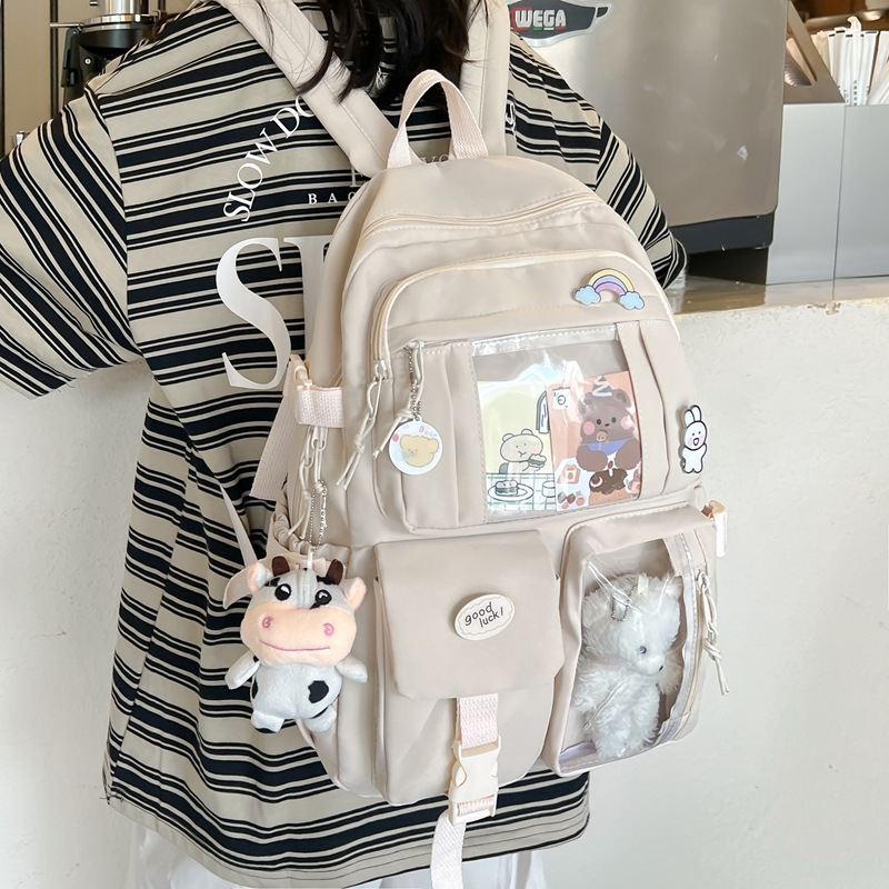 Retro canvas solid-color, fresh and light backpack, casual student schoolbag, female junior high school student, large-capacity college student backpack Application Scenario