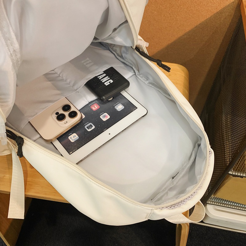 A new 2024 personalized large-capacity backpack for middle school students, a Japanese trendy brand travel backpack for college students and couples Application Scenario