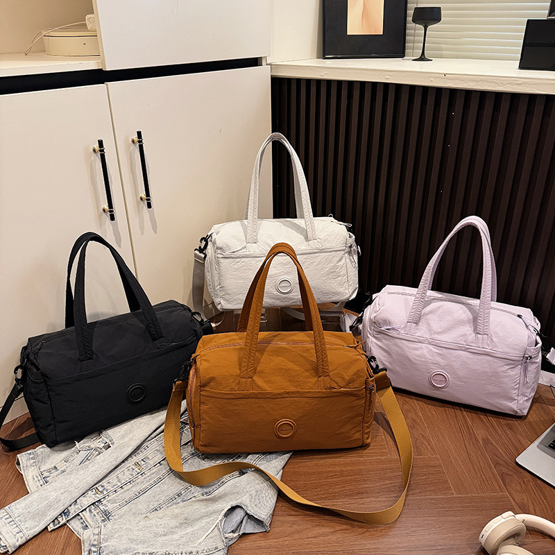 A large-capacity, lightweight and breathable fitness bag for women, a new type of cross-border hand-held travel bag with a handle and a short-distance storage bag for going out details Picture
