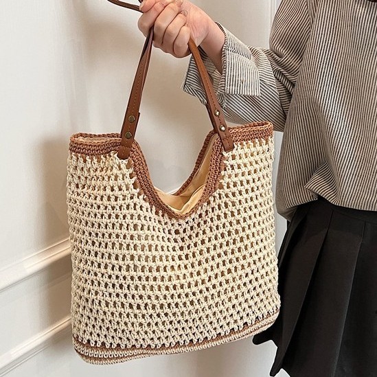 A new Korean-style, stylish and casual handcrafted grid eye hollowed-out knitted large-capacity shopping bag for single-shoulder crossbody women details Picture
