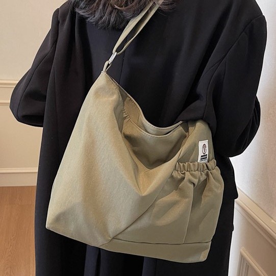 A niche design 2025 new dumpling bag, a versatile and fashionable single-shoulder bag for commuting, and a high-end quality crossbody canvas bag Specification drawing