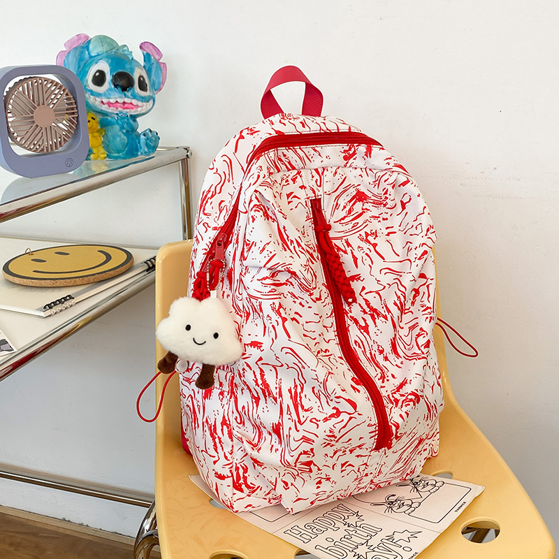 Graffiti high appearance level schoolbag, girls' junior high school backpack, high school and college students' campus ultra-light new simple backpack details Picture